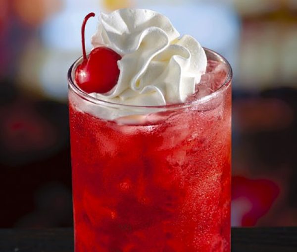 Raspberry Cream Soda with whipped cream and garnished with cherry