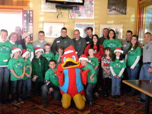 Group photo of Red Robin Mascot Red and Colonial Regional Police Department at Shop With Cops Event