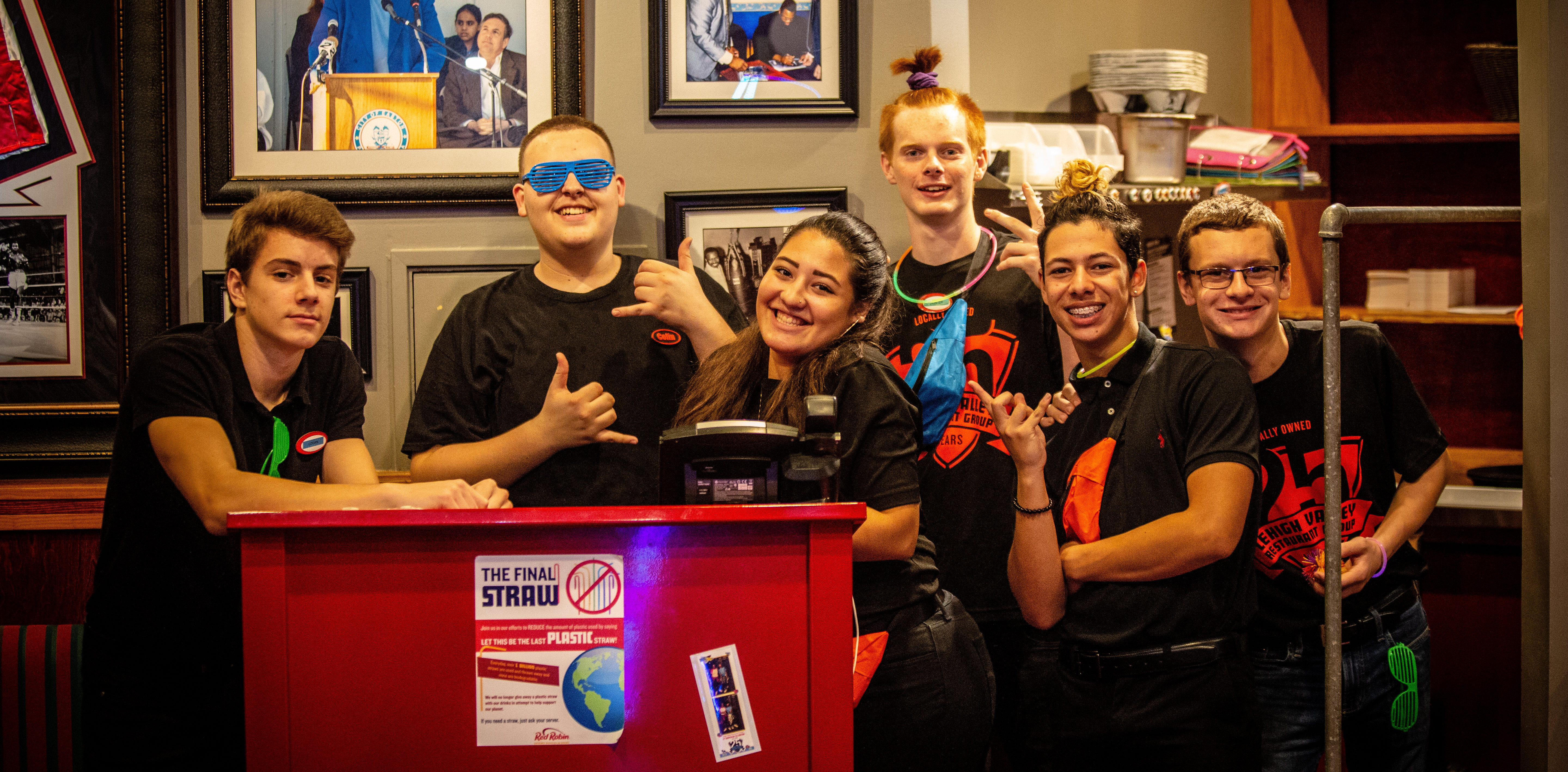 Image of a group of Red Robin Team Members at the host stand in the Northampton Crossings Red Robin location. From the LVRG 25th Anniversary Celebration event.